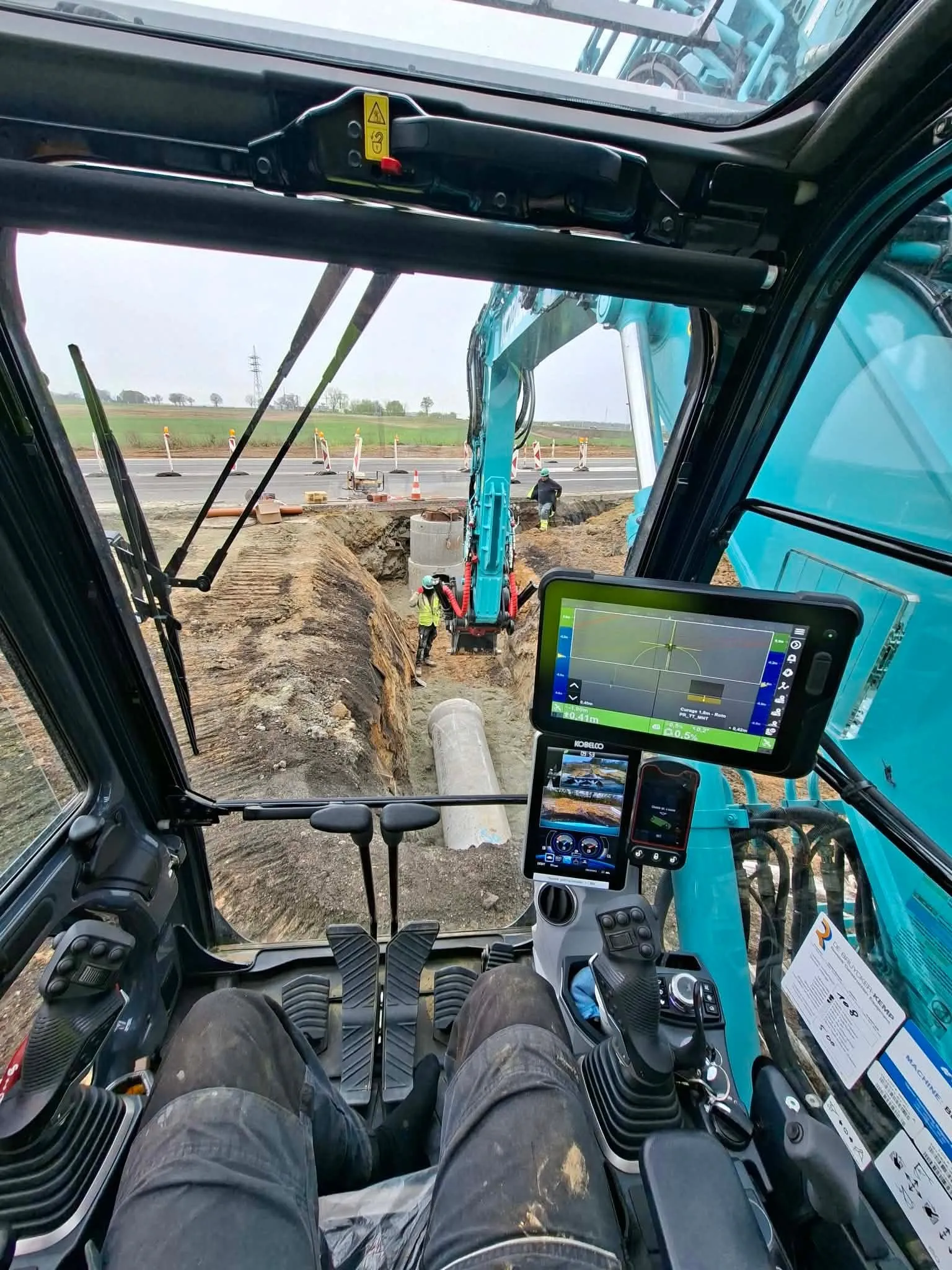 Tranchée d'égouttage guidée au GPS depuis la cabine